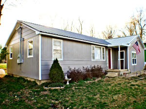 Super home with an AMAZING Master retreat! Don't miss this one being on your list. This home boasts a huge newly remodeled Master Bedroom and Bath with a grand walk-in closets that will make your heart go boom-boom! Perfect for a family that needs some space with 4 bedrooms and 3 full baths there will be room for everyone. So many updates! Including a new roof, new HVAC, septic, new addition for the Master Retreat and so much more! Don't let this one slip through your fingers. The second home can be moved off the property or purchased at an additional cost.