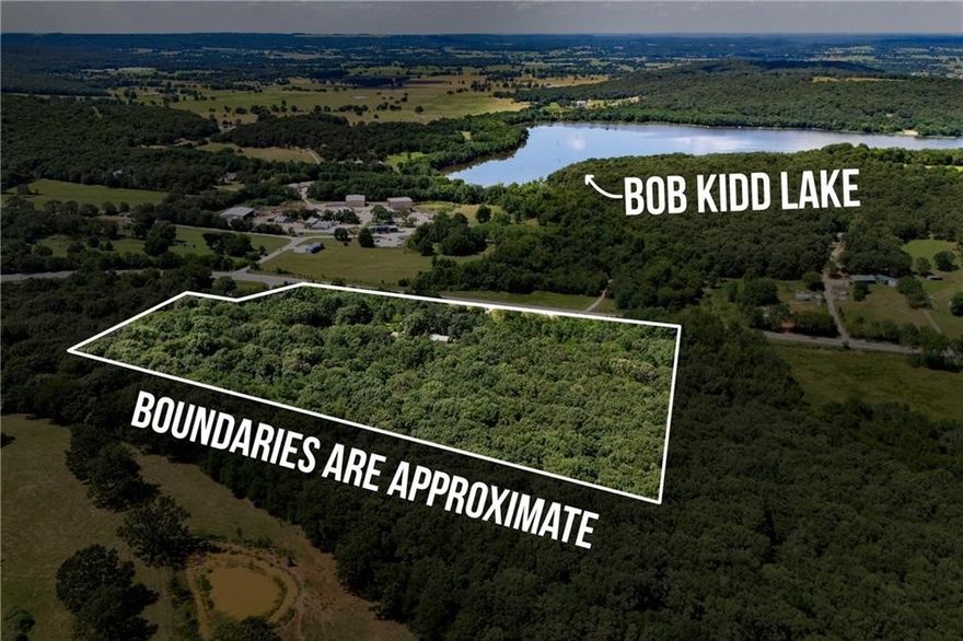 Motivated sellers! Seller agrees to offer a $5,000 seller concession to the buyer at closing, to be applied toward buyer's closing costs, prepaids, or other allowable expenses, subject to lender approval. Welcome to nearly 20 acres of beautiful, usable land along Highway 62 in Prairie Grove. This unique property offers the perfect blend of privacy, functionality, and outdoor appeal—whether you’re dreaming of a country homestead, a hobby farm, or an investment opportunity. You’ll find a mix of cleared level areas, gently rolling pasture, mature trees, and established trails ready to explore. Located just minutes from Bob Kidd Lake, this spot is ideal for fishing, kayaking, or relaxing by the water. With space to roam and endless potential, this land is ready for whatever vision you bring to life.