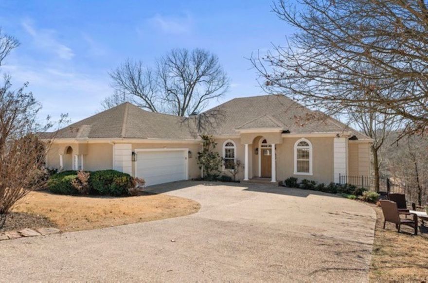 Dreaming of living on the lake? This freshly updated lakefront property can be yours. See list updates. This home hosts 4 bedrooms, 2 living rooms plus a bonus room for office, also extra storage room in the downstairs. Home offers a tram and stairs to access boat dock, a pontoon boat will convey with a full offer. House has been used as Airbnb, but will not be hosting guest at this time, so buyers can easily view the vacant house.