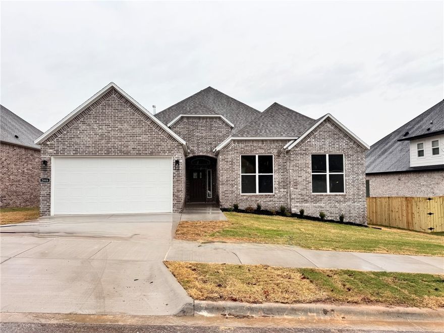 The lovely Kelsey plan in Hughmount, located in Fayetteville, Arkansas! The Kelsey plan includes 4 bedrooms, 3 baths, and 2465 square feet. These brand-new homes boast 4-sided brick and LVP flooring. Upon entering, you will find a spacious living area featuring a gas fireplace with a poplar mantle. The kitchen will have 42-inch cabinets, lovely appliances and quartz countertops and tile backsplash.  The Primary bedroom has a fabulous ensuite, dual sinks, with a walk-in shower with tiled walls and a soaking tub! These homes feature LED lighting throughout, and a high efficiency AC with programmable Wi-Fi thermostat. Come find your dream home today! Taxes and Parcel TBD. Garage Door Opener!