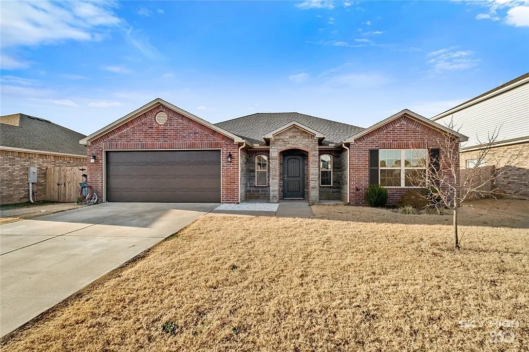 **UPDATED PRICE!!**
Check out this beautiful rental in southeast Bentonville! It's a full brick home with 4BR/2BA at 1730 SQFT. It offers a spacious kitchen with granite countertops, stainless appliances and includes a refrigerator. There is hard-surface flooring throughout with carpet in the bedrooms. The primary bedroom has a large owner-suite bathroom with double vanity and large walk-in closet. Outside you'll find a spacious patio and a fully fenced private backyard.
Currently move-in ready!