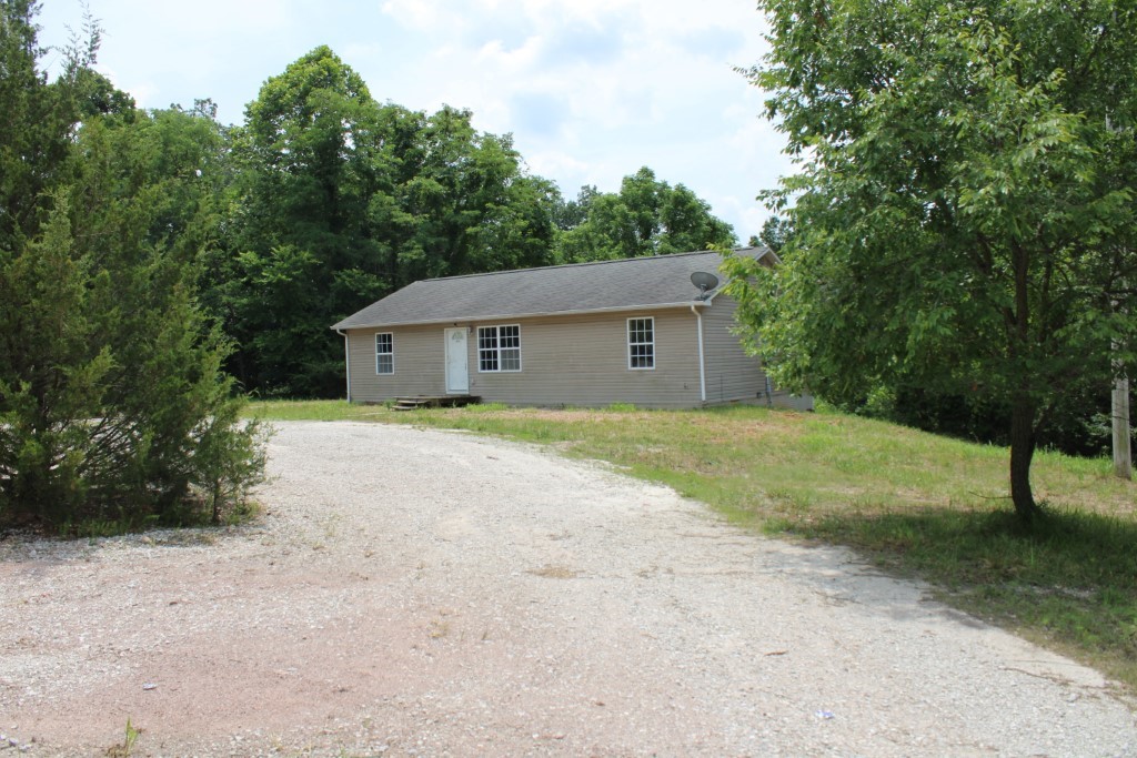 Cottonwood Road - Tucked away from the road you'll find this 3 bedroom 2 bath home with split bedroom plan, living-dining-kitchen-utility room-3 bedrooms-2 baths on main floor plus full walkout basement, unfinished but plumbed for 3rd bath. Includes 3.92 acres only 2 miles from Harrison with a long driveway and wooded area with that provides privacy. Home being sold as is, needs maintenance and repairs, will not qualify for FHA, VA, RD, or Secondary market financing, be sure your lender will accept As Is condition, loan pre-qualify letter /or proof of cash funds required with offer. Seller will review owner-occupant offers after 7 days on market and Investor offers after 21 days on market. Buyer may use any lender they choose but Seller requires that all non-cash offers be pre-qualified by NewRez prior to negotiation of the offer. Please contact Joseph Perrone at 719-331-0555 or email joseph.perrone@newrez.com. Age, sq ftg, acreage, etc, are from public records, buyer to verify.