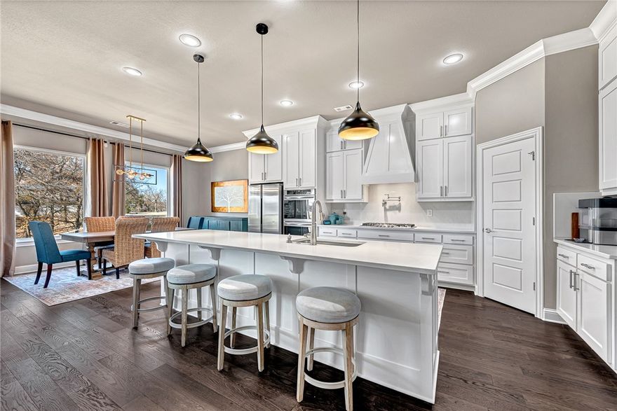 Uncover unparalleled luxury in this 4-bed, 3-bath residence on a 2.03-acre lot, surrounded by nature and privacy. Built in 2022, the home harmonizes contemporary design with thoughtful features. The kitchen is a culinary haven with quartz countertops and backsplash, a large island, double oven, gas cooktop, and a convenient pot filler. Retreat to the primary bathroom, where a vessel tub awaits.
Expansive picture windows frame the serene backdrop of trees, creating a seamless connection to nature. Hardwood floors add warmth and sophistication to the interiors. Upstairs, a versatile bonus room offers flexible living spaces. Step outside to the large covered patio for outdoor relaxation and entertainment. The 3-car garage, finished with epoxy, combines functionality and style. This property is a carefully curated retreat where modern design meets the tranquility of its natural surroundings, ensuring a life of comfort and refinement. Please see attachment for convenient restaurant, businesses and shopping. JB Hunt 38m