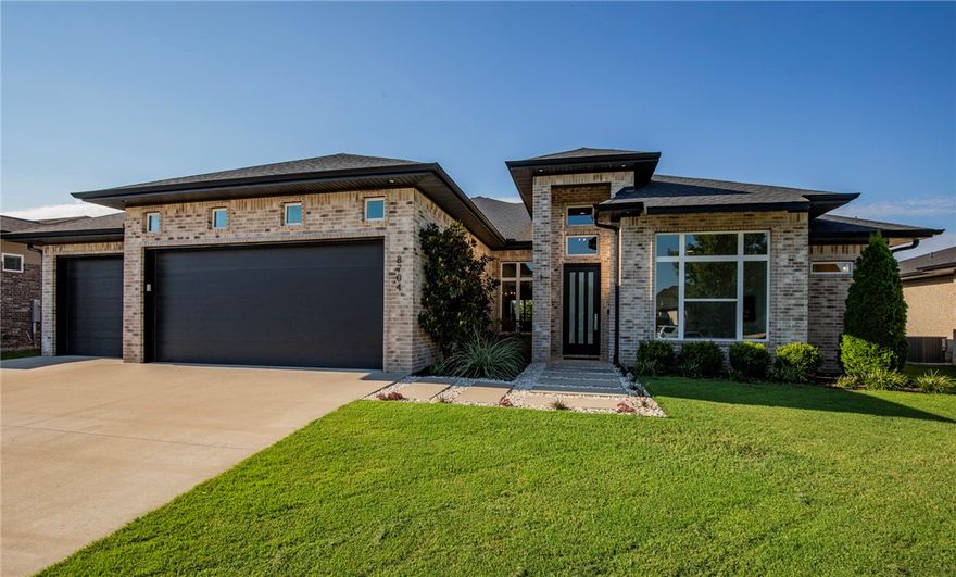 Live the good life in gated Scissortail! This impeccably maintained home blends contemporary style with everyday comfort. Entertain with ease in the open layout featuring quartz countertops, a wine fridge, and included kitchen refrigerator. Unwind in the hot tub or retreat to the spa-like primary suite with heated tile floors in the primary bath. Outdoors, enjoy professional landscaping with LED lighting, front and back. The EV-ready garage and brand-new 5-ton HVAC (June 2025) add modern convenience. Scissortail’s resort-style amenities—two pools (one adult-only), clubhouse, fitness center, tennis, pickleball, playground—make every day feel like vacation.