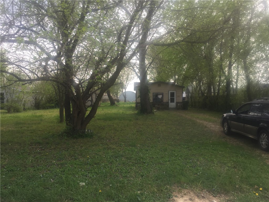 Nice little starter home or good investment. with lots of potential. Nice mature shade trees.