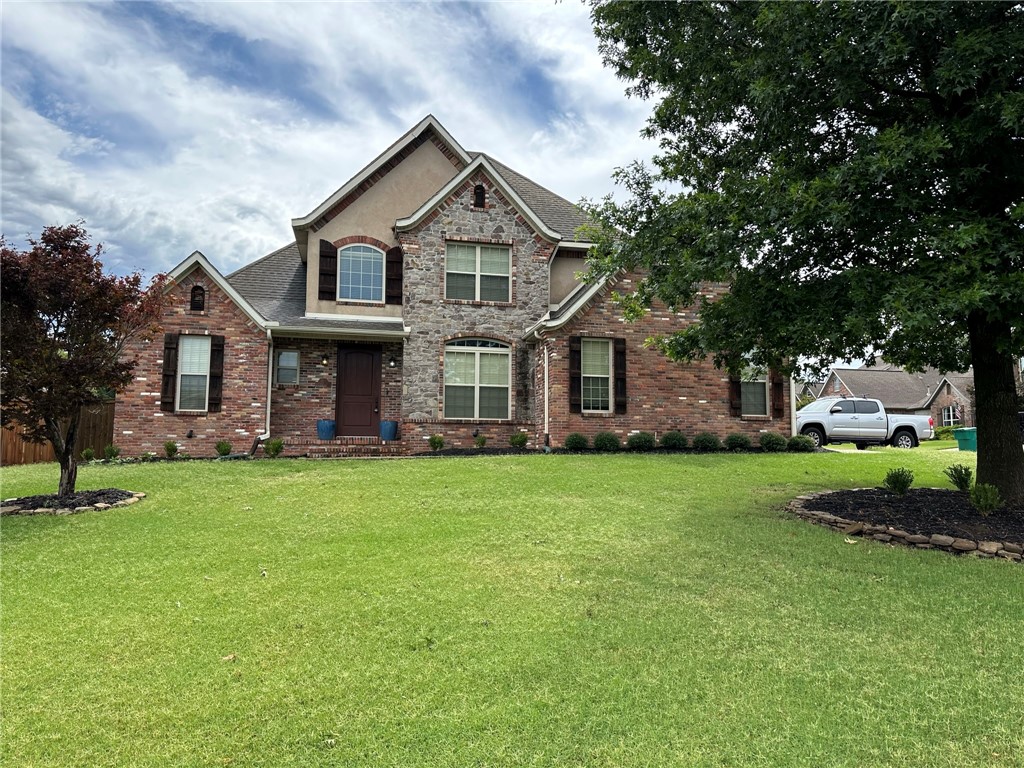 Gorgeous 4 bedroom & 2.5 bathroom home in Rogers on half an acre! Highly sought after neighborhood with community amenities to include neighborhood pool, playground, and walking trails. Amazing location close to the Razorback Greenway bike path, AMP Music Pavilion, easy access to I-49, and loads of shopping and restaurants. Primary bedroom on main level with bathroom featuring large tub, walk-in shower and walk-in closets. 3 other bedrooms and 1 full bath on 2nd level. House features 2 fireplaces with one in the living room and another one in the den. Covered back patio, fenced in backyard, and ALL LAWN/YARD CARE INCLUDED IN RENT!! 80" TV above the fireplace will stay, but not warranted for repairs. Security system to convey to tenant through end of 2023...tenant responsible if they want to continue with service after that.