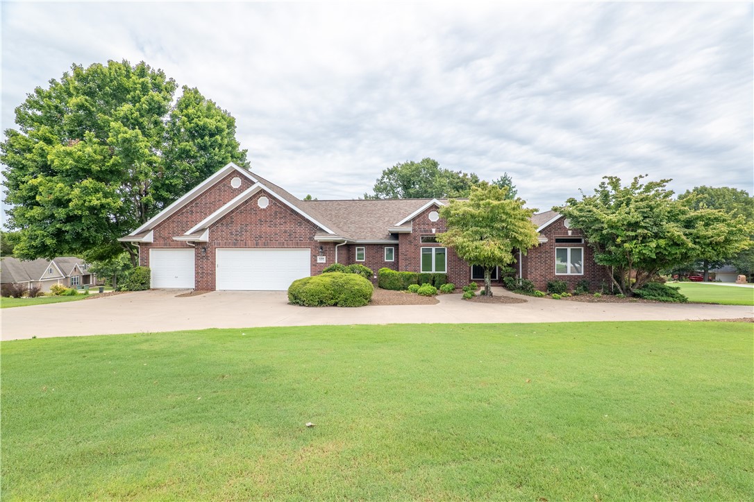 Welcome home to this perfectly maintained property. 4,098 Sq. feet of complete custom living. A stone throw from the Prairie Creek Marina boat slip. Large wrap around driveway, perfect for guests and ample parking! 4 car garage. Fourth garage is around the side, perfect for working on car projects or parking your off roads. Massive back deck, perfect for entertaining, equipped with indoor and outdoor Bose speakers for any occasion (deck done in 2023)!
Open concept and split floor plan with refinished hand scraped wood flooring, high ceilings, exposed beams, granite kitchen, quartz bathroom counters with updated modern fixtures, an eye catching formal dining room, fireplace & fresh paint through out! Spacious master w/walk in closet, & double vanity quartz counter. Roof is fairly new (2020). Down stairs A built in office, movie theater for entertainment (projector and seating included), granite wet bar, (fridge included) & natural stone flooring. All game room equipment conveys (shuffle board, and pool table set).