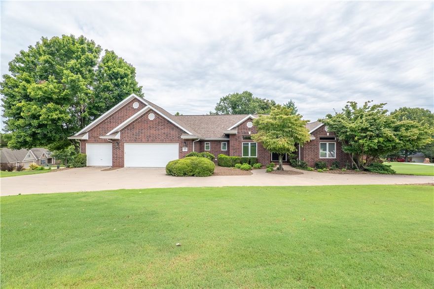 Welcome home to this perfectly maintained property. 4,098 Sq. feet of complete custom living. A stone throw from the Prairie Creek Marina boat slip. Large wrap around driveway, perfect for guests and ample parking! 4 car garage. Fourth garage is around the side, perfect for working on car projects or parking your off roads. Massive back deck, perfect for entertaining, equipped with indoor and outdoor Bose speakers for any occasion (deck done in 2023)! 
Open concept and split floor plan with refinished hand scraped wood flooring, high ceilings, exposed beams, granite kitchen, quartz bathroom counters with updated modern fixtures, an eye catching formal dining room, fireplace & fresh paint through out! Spacious master w/walk in closet, & double vanity quartz counter. Roof is fairly new (2020). Down stairs A built in office, movie theater for entertainment (projector and seating included), granite wet bar, (fridge included) & natural stone flooring. All game room equipment conveys (shuffle board, and pool table set).