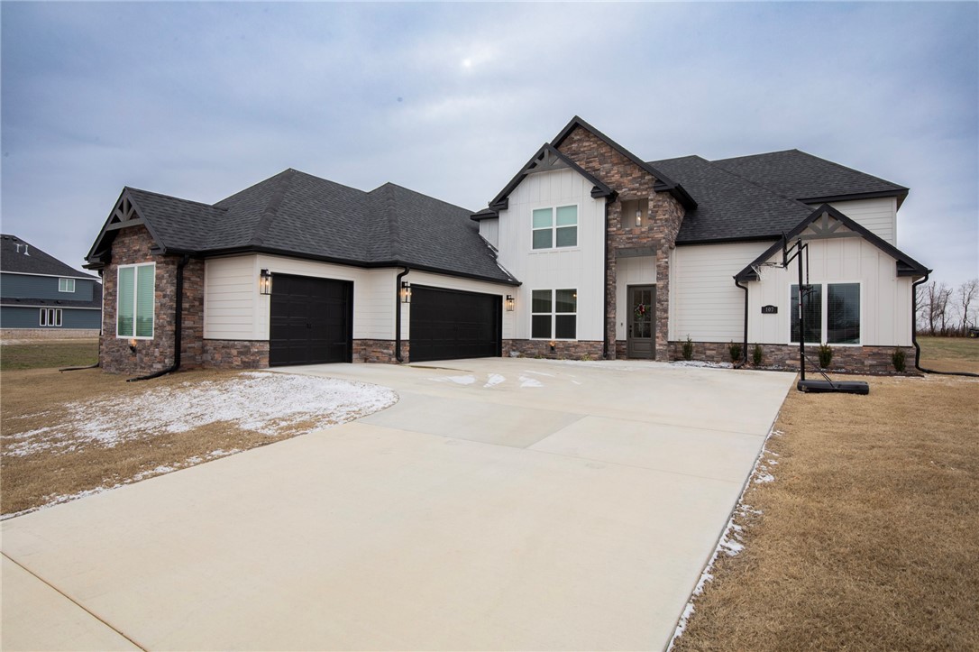 Welcome to Jenna Estates, a neighborhood just outside of Bentonville, only 2 miles off Highway 149. This home offers privacy and lots of space on its almost 1.5 acre lot. Walk into this spacious, open and airy, 4 bedroom, 5 bathroom home. Each bedroom comes with its own private bathroom, ensuring everyone has their own space. In addition to the bedrooms, you’ll find a separate office or 5th bedroom—ideal for working from home or creating a quiet reading nook. The open-concept kitchen is a dream, featuring elegant hardwood floors and plenty of counter space for cooking and entertaining. The bonus room upstairs offers versatility for anything you envision—whether it’s a home theater, game room, or craft area. The gorgeous primary suite is a true escape, complete with a luxurious soaker tub and a large, walk-in tile shower. For those who love their space, the oversized 3-car garage provides plenty of room for vehicles, tools, or extra storage. Come experience the warmth and charm of this home!