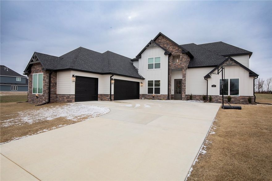 Welcome to Jenna Estates, a neighborhood just outside of Bentonville, only 2 miles off Highway 149. This home offers privacy and lots of space on its almost 1.5 acre lot. Walk into this spacious, open and airy, 4 bedroom, 5 bathroom home. Each bedroom comes with its own private bathroom, ensuring everyone has their own space. In addition to the bedrooms, you’ll find a separate office or 5th bedroom—ideal for working from home or creating a quiet reading nook. The open-concept kitchen is a dream, featuring elegant hardwood floors and plenty of counter space for cooking and entertaining. The bonus room upstairs offers versatility for anything you envision—whether it’s a home theater, game room, or craft area. The gorgeous primary suite is a true escape, complete with a luxurious soaker tub and a large, walk-in tile shower. For those who love their space, the oversized 3-car garage provides plenty of room for vehicles, tools, or extra storage. Come experience the warmth and charm of this home!
