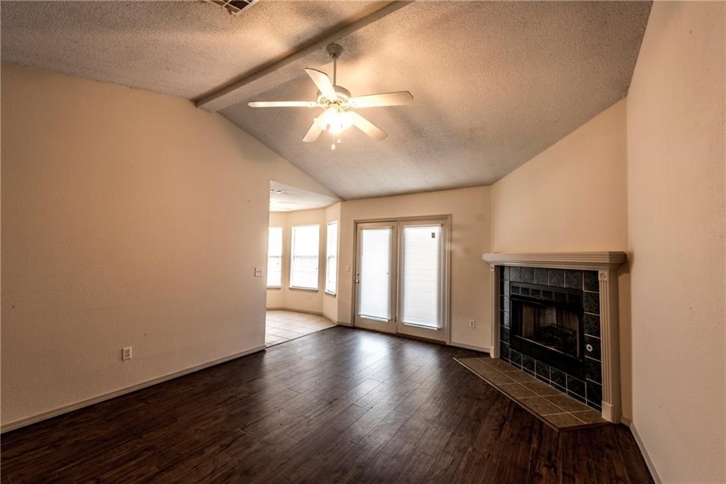 Available now! Taking applications now. This cute 3bd/2ba home features wood look flooring as well as a fenced in backyard! Cozy up to the fireplace in the living room while you enjoy your favorite book. *Tenant responsible for all utilities and lawn maintenance.