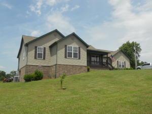 3BR 2BA brick home with over 1,800 sq ft on 5.45 acres in Valley Springs. Home features open floor plan, 9 ft ceilings, all stainless appliances, whirlpool tub, 2 walk in closets, pellet wood stove, 2 hot water heaters, 6 in walls with R19 ins and R38 in the ceilings. Enjoy the view of the mountains from the 10x52 screened in porch. Workshop area with roll up door in the unfinished basement.