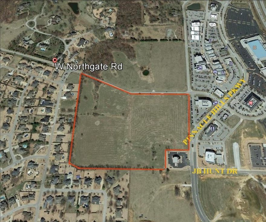 Unbelievable development opportunity on 18 acres of prime land in fast-growing Pinnacle area of Rogers, on west side of I-49 just off Pinnacle Hills Parkway/Champions Dr at Northgate. Near international and national businesses, John Q Hammons Convention Center, Embassy Suites, The AMP, restaurants, shopping, banks, Pinnacle Hills Country Club. This area has it all with room for your development and business too! Reach tens of thousands of people a day in this HOT location!