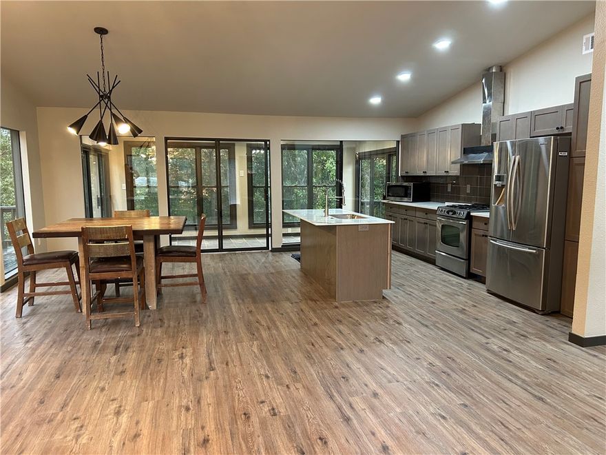 Lake living at it's best in a completely renovated home! BRING ALL OFFERS!  A hunter's dream on 12 acres that backs up to Hobbs State Park. New electric, HVAC, plumbing and all finishes. Floorplan allows for separate quarters with outside entrance downstairs. Primary with bath + 2 bedrooms & bath on main floor. Large 10 x 20 sunroom off living room. Separate 512 square foot shop/storage and a separate 120 square foot cabin/playhouse - both with electric. Five minutes from public boat launch at Coppermine and 12 minutes from Rocky Branch. This property has it all!