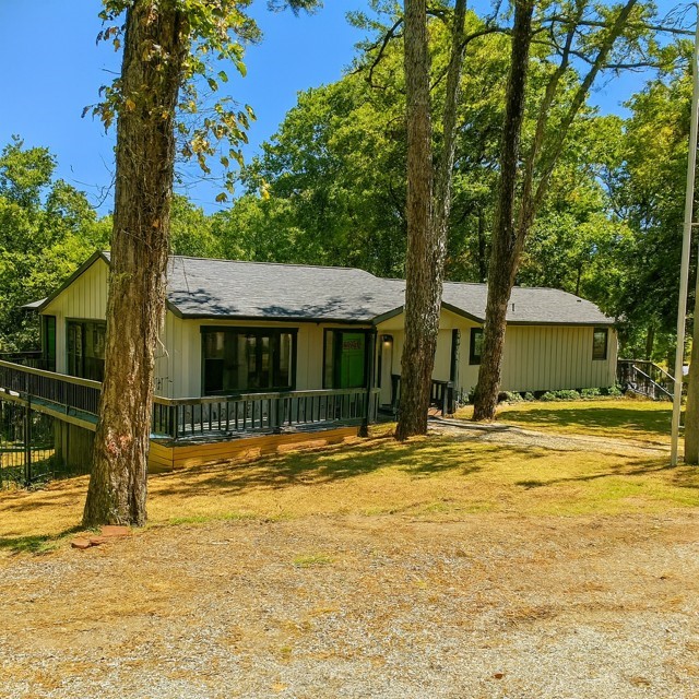 Lake living at it's best in a completely renovated home! BRING ALL OFFERS!  A hunter's dream on 12 acres that backs up to Hobbs State Park. New electric, HVAC, plumbing and all finishes. Floorplan allows for separate quarters with outside entrance downstairs. Primary with bath + 2 bedrooms & bath on main floor. Large 10 x 20 sunroom off living room. Separate 512 square foot shop/storage and a separate 120 square foot cabin/playhouse - both with electric. Five minutes from public boat launch at Coppermine and 12 minutes from Rocky Branch. This property has it all!