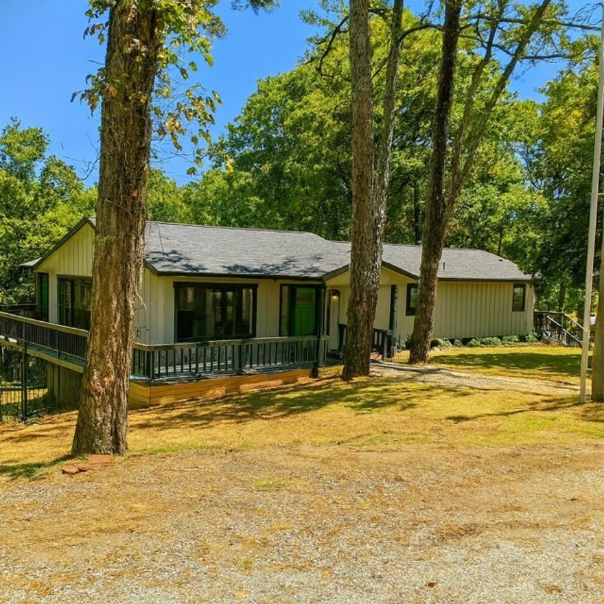 Lake living at it's best in a completely renovated home! BRING ALL OFFERS!  A hunter's dream on 12 acres that backs up to Hobbs State Park. New electric, HVAC, plumbing and all finishes. Floorplan allows for separate quarters with outside entrance downstairs. Primary with bath + 2 bedrooms & bath on main floor. Large 10 x 20 sunroom off living room. Separate 512 square foot shop/storage and a separate 120 square foot cabin/playhouse - both with electric. Five minutes from public boat launch at Coppermine and 12 minutes from Rocky Branch. This property has it all!