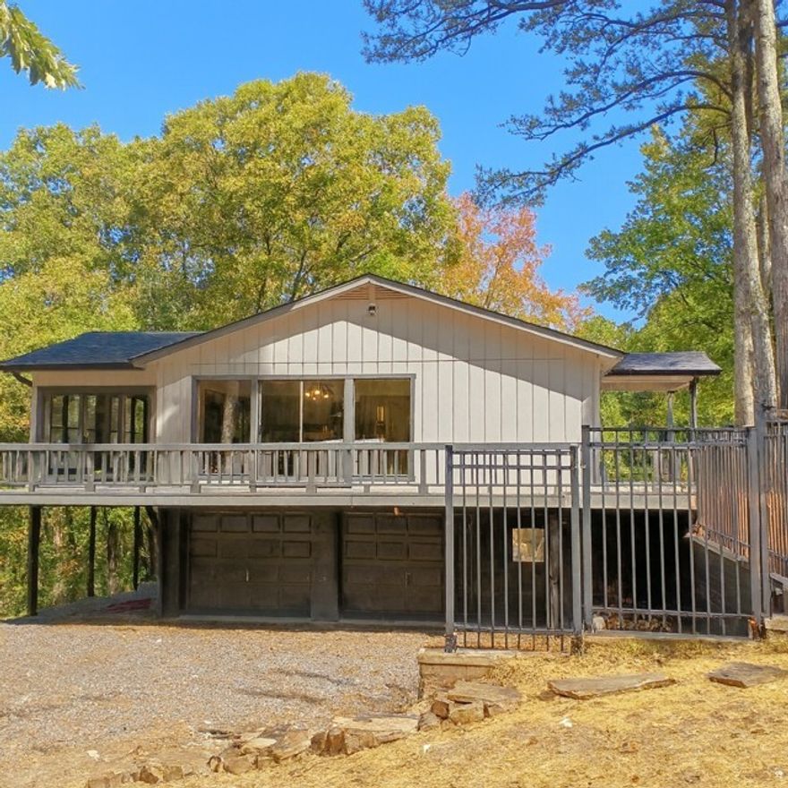 Lake living at it's best in a completely renovated home! BRING ALL OFFERS!  A hunter's dream on 12 acres that backs up to Hobbs State Park. New electric, HVAC, plumbing and all finishes. Floorplan allows for separate quarters with outside entrance downstairs. Primary with bath + 2 bedrooms & bath on main floor. Large 10 x 20 sunroom off living room. Separate 512 square foot shop/storage and a separate 120 square foot cabin/playhouse - both with electric. Five minutes from public boat launch at Coppermine and 12 minutes from Rocky Branch. This property has it all!