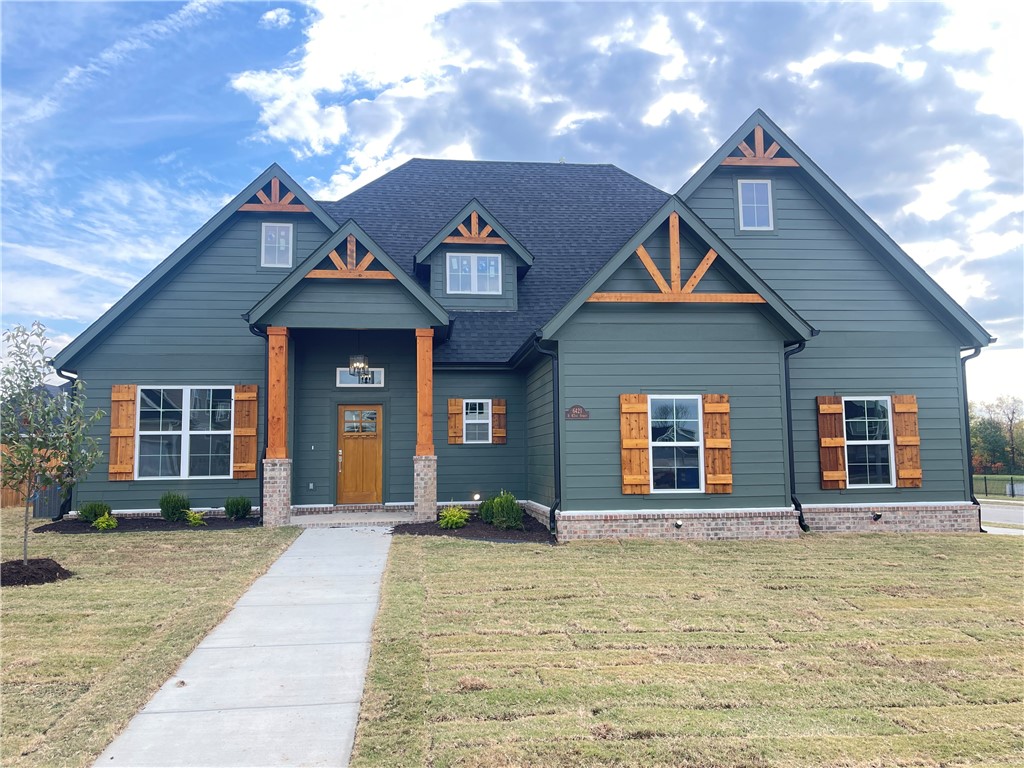 New construction home in desirable area in SW Rogers! It features 4 bedrooms/3.5 baths/bonus room/3 car garage. Downstairs has open concept in the living and kitchen area. Kitchen is equipped with gas cook top, built-in oven and microwave, large island, pantry, and eat-in dining. Primary is on main level with a spacious bath and closet. Study and half bath also sit downstairs. Upstairs has bedrooms 2-4, 2 full baths, and the bonus room.