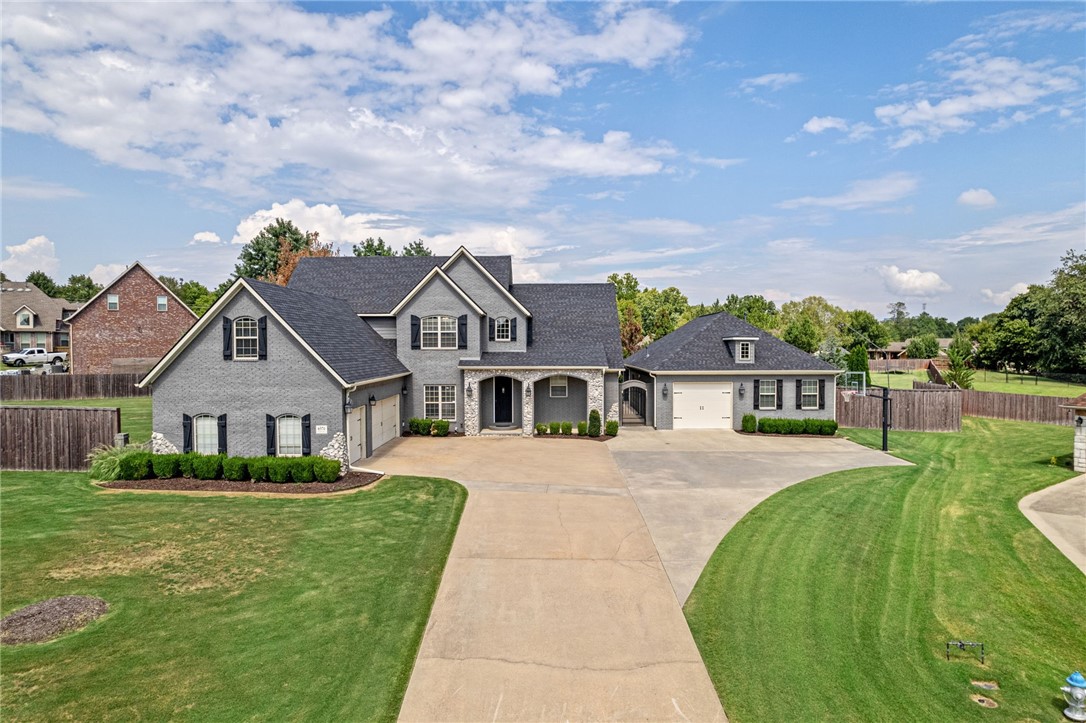 Absolutely gorgeous home in a prime location! Situated on 1+/- acre lot within minutes from Children's hospital, Arvest ball park, fantastic schools, shopping, entertaining & dining! This stunning main home is 3962sqft w/ 5 bedrooms, 5 3/4bath & large bonus room. You are immediately greeted by beautiful wood floors, arched entries, open living concept w/ formal dining, spacious living room, eat in kitchen/breakfast area, all open to the beautiful kitchen. Enjoy the large Master bedroom & bath with private access to the fabulous outdoor living space. On the other side of the home is the 2nd bedroom w/ full bath, & main laundry room. Upstairs you will find a huge 3rd bedroom w/attached bath, 4th & 5th bedrooms, shared 1 3/4 full bath, a private study nook or flex space leading to the bonus room. Moving to the 1100sqft POOL HOUSE! Surrounded by the resort style pool, the pool house has a large bedroom, full bath, fully equip large kitchen for fantastic entertaining, a laundry, gorgeous living rm,& attached garage.