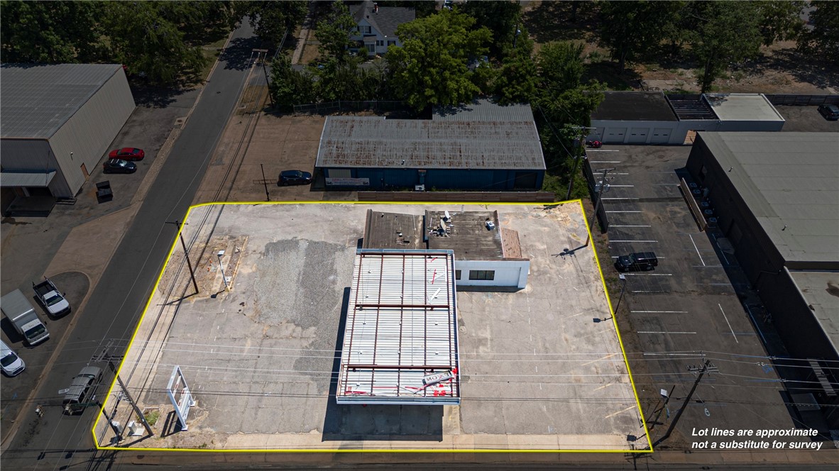 Prime location in the apron of downtown Russellville! This site is located on a hard corner with walkability to the growing downtown and adjacent to the recently renovated Innovation hub in Russellville. The property has been stripped to white box form and is ready for re development. Survey on file as well as tank removal and closure documentation.