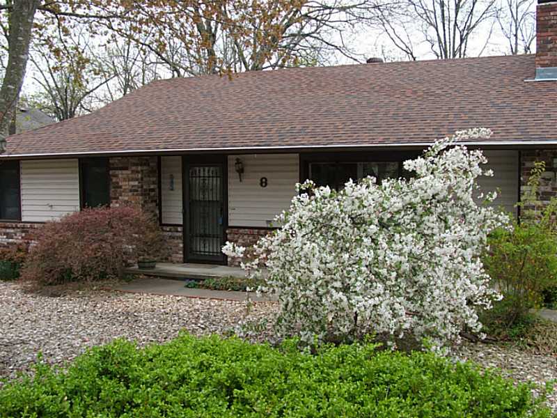 Make this delightfully updated home your own ! One owner non-Cooper house - large living room with brick fireplace - 2 large bedrooms - ceramic bathrooms - family room with winter golf course view - utility room has pantry, sink - sunroom and deck 2012 -,Garage is oversized with golf cart or workshop alcove, extra storage and cedar closet - updates include gas logs 1995, 2005 all exterior wood covered with vinyl - HVAC and roof 2006 - 2009 new windows & kitchen counters recoated - walk-in master shower