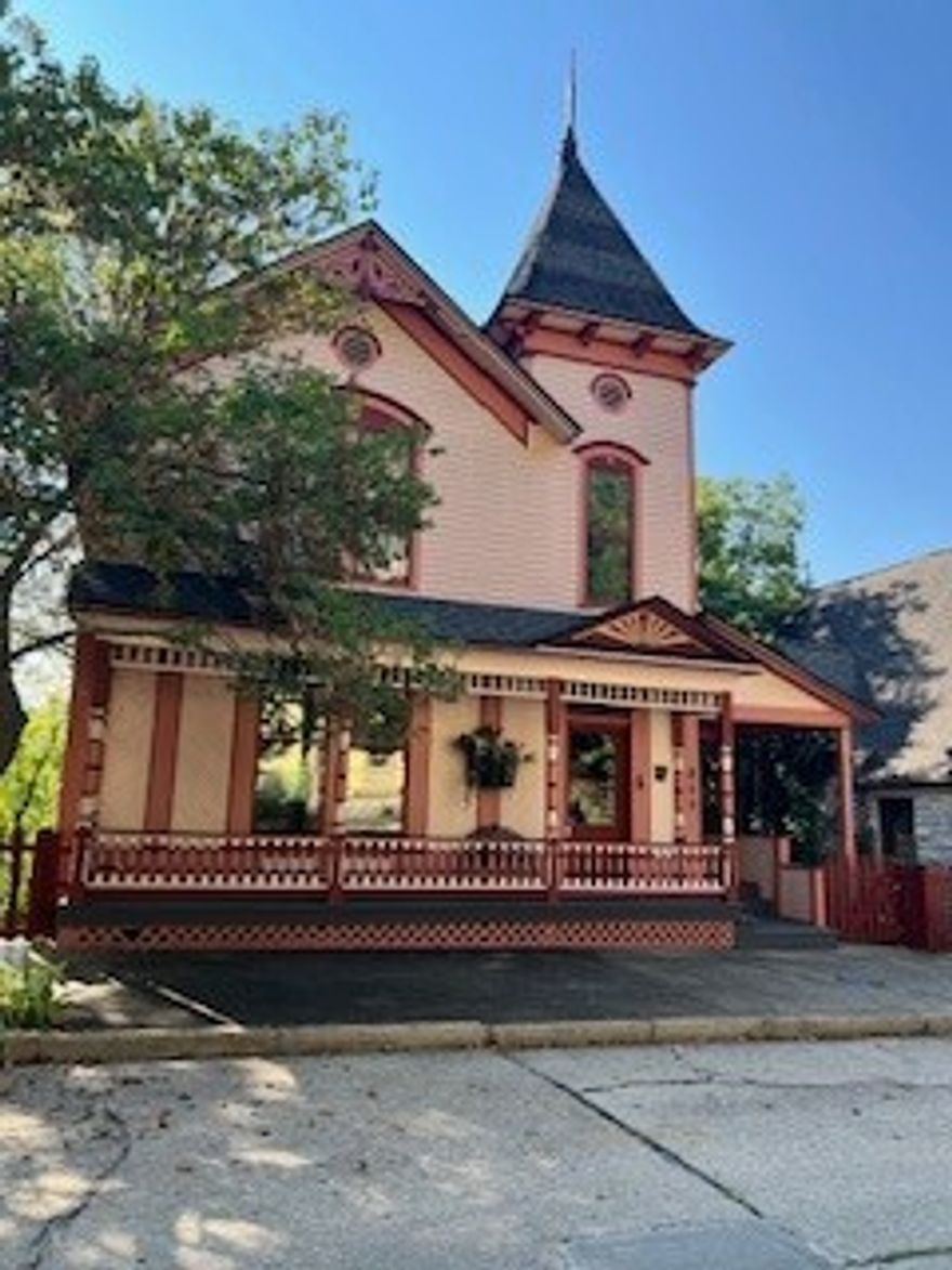 What an incredible location in downtown Historic Eureka Springs.Crescent Cottage, built in 1881 by Brigadier General Powell Clayton of the Union Army and the ninth governor of Arkansas, is a classic Queen Anne Victorian that is listed on the National Register of Historic Places. The 5BR/5.2BA home boast plenty of room for family and friends.  The newly remodeled kitchen is a dream!  Custom Big Chill refrigerator and stove. Copper and brass Vent Hood. New spa like bathrooms with soaking tubs and tiled showers with glass walls, body jets and rain heads. New kitchen with granite counters and custom cabinets. Gas log fireplaces. Large double porches in back with great views of East Mountain and Christ of the Ozarks. Detached garage and additional parking on Spring Street. Easy walk to downtown.  View the famous Statue from your glorious back porch!