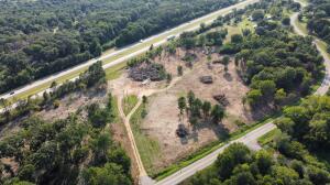 Introducing a rare opportunity! This expansive 20-acre parcel of prime land is a canvas awaiting your vision. Nestled alongside the bustling I-40 interstate and adjacent to Highway 352, it boasts unrivaled accessibility and visibility, making it an ideal location for a variety of ventures. Whether you envision a commercial development, residential community, or an industrial project, this land's potential is boundless. Schedule your showing today.