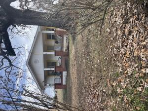 Cute quaint 3 bedroom 1 bathroom home conveniently located right outside city limits. Enjoy the peacefulness of the countryside while only being a few miles away from shops and medical facilities. This home comes with 1 large hay barn and 1 large barn.