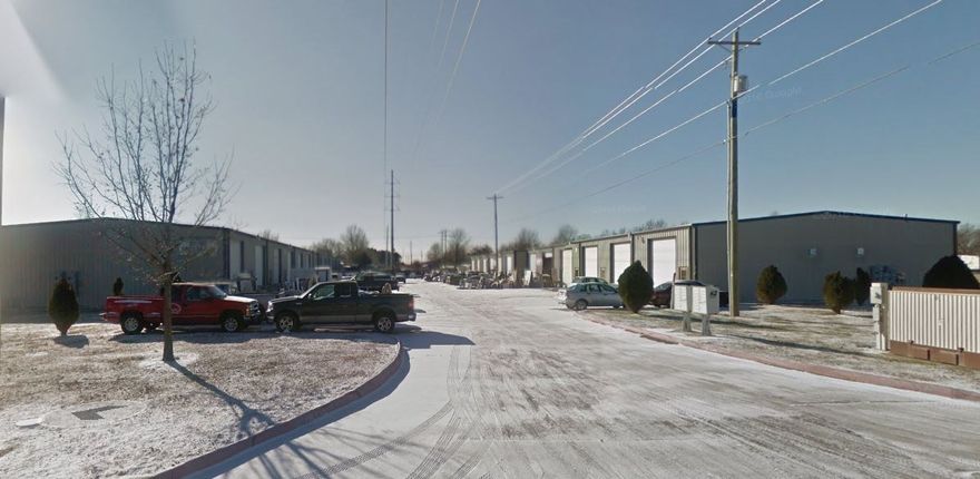 This property offers a cash flowing investment, low maintenance and a excellent location. 
With 24 individual bays with one 15 foot overhead door and one walk-through door per bay. 4 separate buildings with 6 bays per building sitting on 1.96 acres of land. Concrete parking lot with all utilities in buildings.