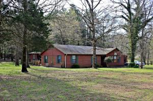 Excellent location, great floorplan, and a large yard! What more could you ask for than this spacious and affordable home on 1.5 acres in the Mill Creek area in a beautiful neighborhood! The home offers 3 bedrooms, 2 baths, formal and informal dining areas, a large open kitchen and a big bright living area with cathedral ceiling, cozy fireplace, beautiful beams, and a large sunny window. This is a perfect place to call home! Seller will pay $5000 toward a new roof at closing with an acceptable offer.