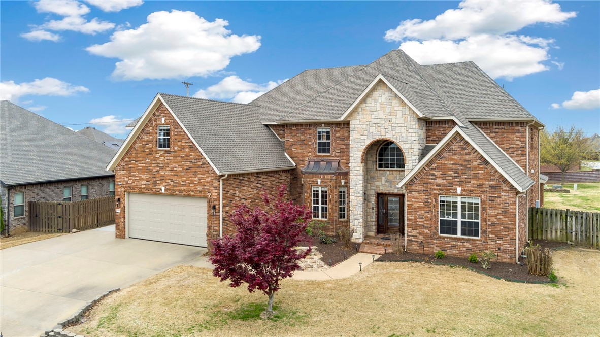 Welcome to luxurious living in Liberty Bell Estates! Upon entering, you are greeted by a grand foyer that leads you into the heart of the home. The expansive living room features soaring ceilings built-ins, and a beautiful fireplace, creating a warm and inviting atmosphere for gatherings with family and friends.
Offering 5-bedroom, 4.5-bathroom your new home sits majestically on over half an acre lot. Boasting two primary suites, and 3 additional bedrooms this home offers unparalleled space and comfort. The main floor primary suite features an additional sitting room, perfect for unwinding after a long day. With an elevator, this home ensures accessibility for all. The gourmet kitchen is designed perfectly with ample storage space, and a large island that is perfect for meal prep, and casual dining.
Your new home is just minutes away from Rogers Uptown, offering easy access to dining, shopping, and entertainment options, including Top Golf, the Walmart Amphitheater, and more. Schedule your private tour today!