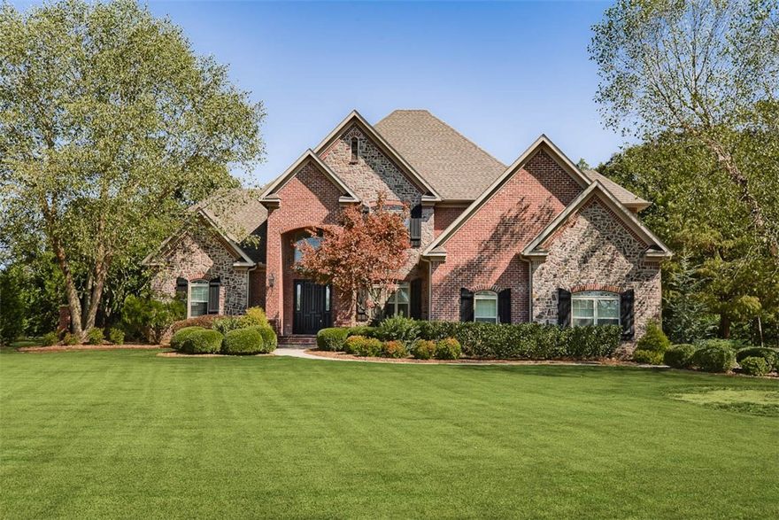 Beautiful Talamore Estate nestled over 3 acres with extensive landscape surrounded by trees & plenty of privacy, enjoy entertaining in this peaceful, relaxing setting! Enter the grand formal room, with curved wooden staircase & high paneled ceiling with intricate trim & crown moldings. This executive home offers over 5,700 square feet with 5 spacious bedrooms, 4.5 bathrooms, formal dining room, 2 fireplaces, game room, media room, bonus room, large open kitchen w/granite countertops & walk-in pantry, & 2 laundry rooms, newly refinished hardwood floors throughout the main floor & new carpet. Large Master Suite, Jacuzzi tub & huge closet located on the main floor w/access to the patio. Walk out through French doors to the covered porch w/fireplace that looks out to a sparkling freeform pool. Guest/pool house has its own kitchen, ice-maker, bath & sauna. This estate is located near top schools & is 15 minutes from the airport & near Walmart’s Home Offices. A breathtaking retreat in a highly desirable area. A must see!