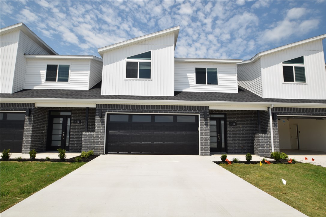 New modern design duplex! Also included brand new side by side stainless refrigerator, washer and dryer. This 3 bed 2 1/2 bath plan has an open living concept with tall ceilings and tons of natural light. Kitchen has granite countertops, stainless appliances, a large pantry, and a gas range. Primary suite is on the main floor and has a beautiful walk-in shower and a large walk-in closet. Two bedrooms upstairs with a full bath and landing area. Wood look tile in main living areas, 2" faux wood blinds, extra storage in the upstairs attic. Property has a private back patio and wood privacy fence. Owner must approve pets and no smoking.