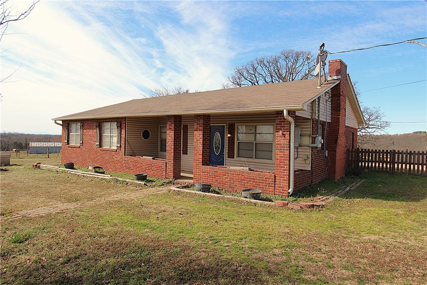 Country setting with a tranquil view. This 3 bed / 2 bath home has two living areas, a wood stove, spacious kitchen and a large primary bedroom with vanity. Covered front and back porches, detached two car garage. fenced backyard. Great view of the neighboring pasture from the back deck. located 1/10 mile off of a paved road.