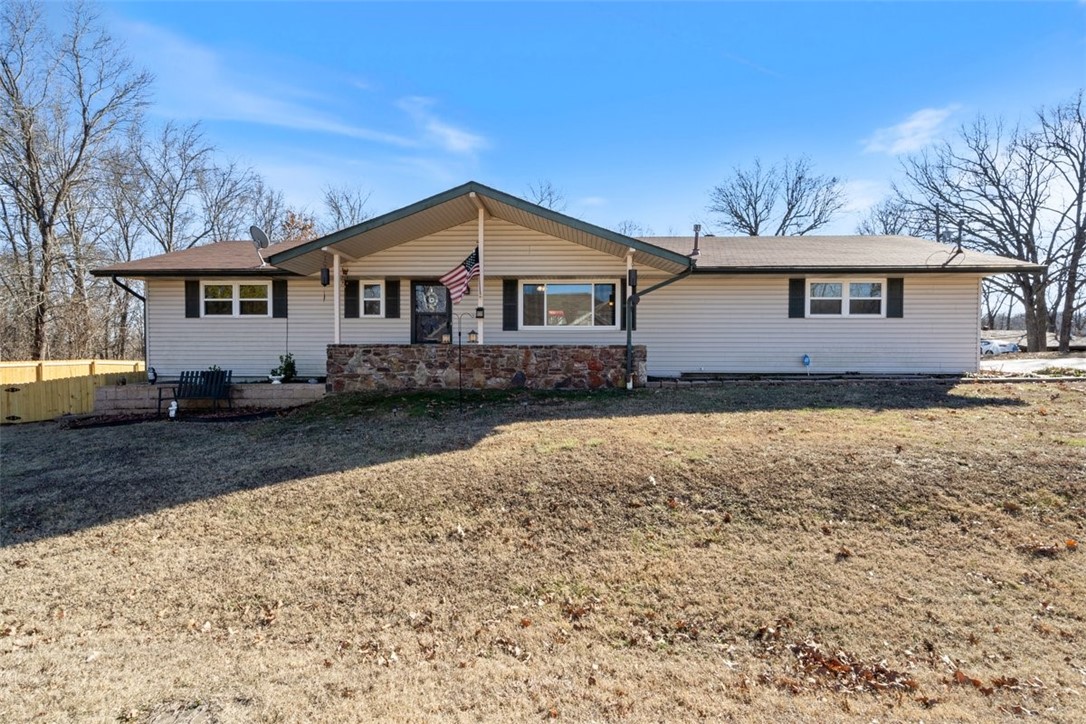 Great things come to those who wait... and this one was worth waiting for! Come take a look at this Lovely 2 bedroom, 2 Bath home with gorgeous hardwood floors that's within minutes of all the best amenities Bella Vista has to offer. You can be out the door & on the trails in less than 5 min & can take your pick of Uphill Both Ways, Lago Vista Spur or Huntley Gravity Park! For even more fun, there are 2 Lakes, The Country Club Clubhouse & Golf Course, the newly remodeled Tanyard Creek Driving Range & the Beach at Lake Avalon all within 5 minutes of this perfectly located gem of a home! Location isn't the only amazing feature as it comes already updated with the following: 2019-New Water Heater, New Heat Pump and all new ductwork. New hardwood floors in bedrooms, new tile, countertops & cabinets in the kitchen, new roof and a moisture barrier all installed in 2020! Last but not least...home sits on a beautifully level .40-acre corner lot, comes with a storage building, a brand-new fence and is on sewer!
