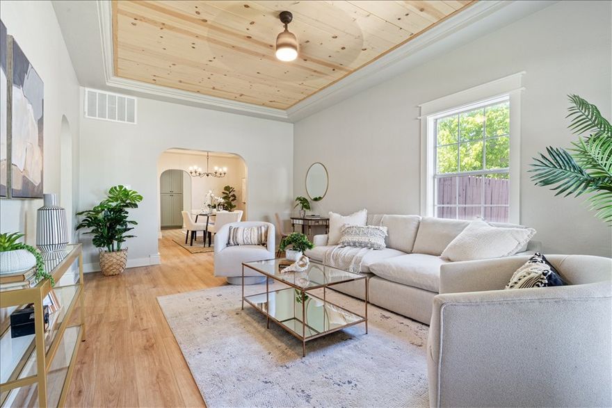 This beautifully updated home blends timeless charm with modern convenience. With plaster exterior and interior walls, arched doorways, wide trim, and an abundance of natural light, it offers character you won’t find in new builds. 3 bedrooms, 2 full baths, and two spacious living areas, plus an upstairs bonus room perfect for a 4th bedroom, office, or flex space. Nearly everything is brand new: fresh interior & exterior paint, custom wood cabinetry, wide-plank LVP, new carpet, countertops, and updated major systems. Enjoy peace of mind with upgraded electrical, two new HVAC units, a 2023 roof, 2023 Water Heater and a premium Samsung appliance package. The kitchen is a showstopper, featuring quartz countertops, a tiled backsplash, deep cast iron sink with disposal, gas range, built-in pantry storage, and designer finishes. Fenced backyard & private courtyard, each with its own storage shed that conveys. Ring doorbell & front porch swing are included. This home is truly turnkey—come see it today!