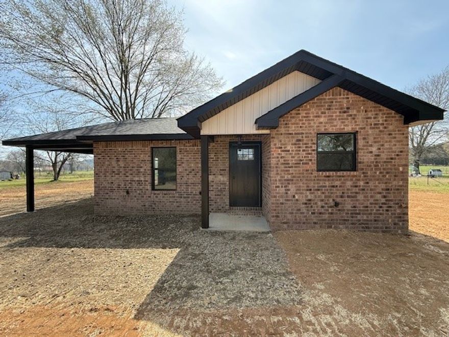 Exquisite craftsmanship from Herrera's Custom Homes. Extreme attention to detail and beautiful modern styling are the hallmarks of this father-son team of builders. Come see this 3 bed 2 bath 1,333 sft+/- home sits on a 1 acre+/- lot with pasture views and close public boat ramp on Lake Dardanelle. This home offers beautiful Quartz counter-tops, stainless steel dishwasher, refrigerator, microwave, range, a multitude of LED recessed lighting throughout, custom built-in storage/shelving, master bed and bath with walk-in closet, walk-in shower, living room electric fireplace, car port, 30 year architectural shingle roof, & covered porch and a storage shed complete with pre-existing well.