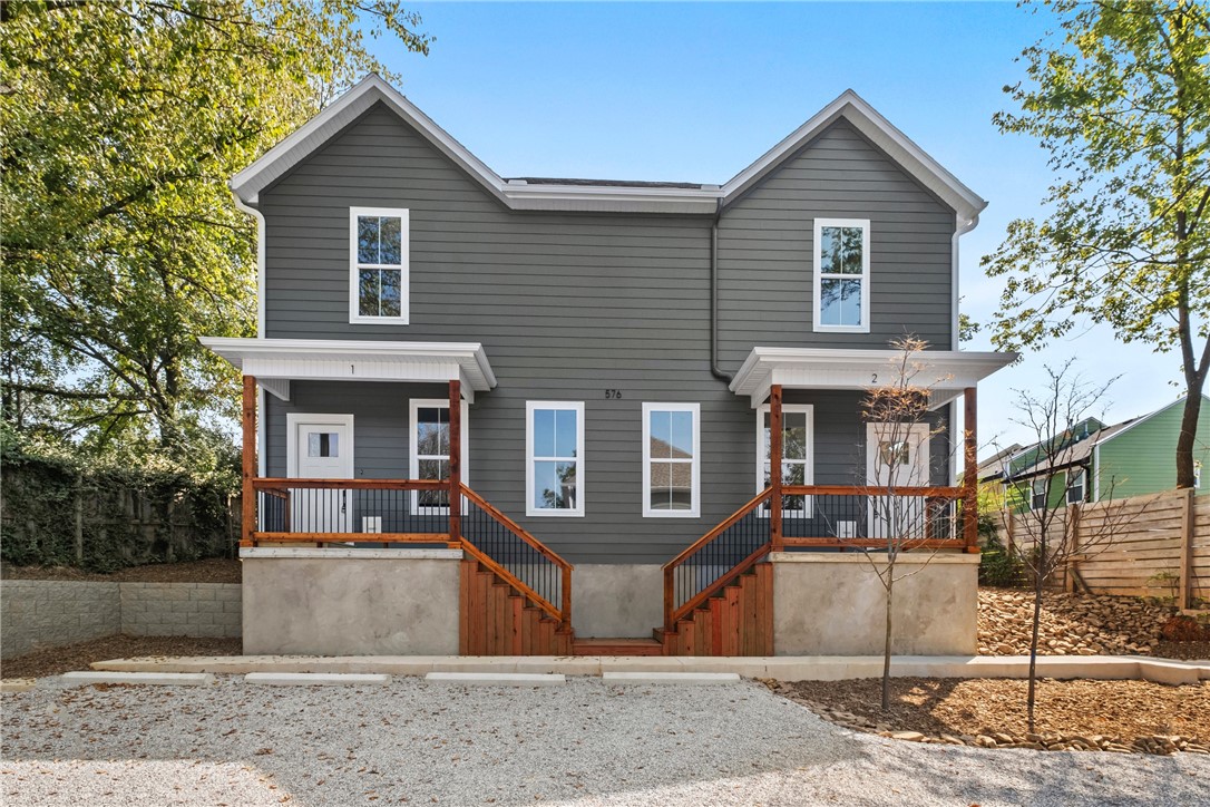 Special Financing Incentives Available through Emily Rainwater with Centennial Bank! Seller is offering up to $5,000 in concessions with an acceptable contract and approved offer, which may be applied toward an interest rate buy-down or closing costs when using the preferred lender. (Buyer must use the preferred lender to capture any incentives.)
Discover modern living in this brand-new duplex located just off MLK in Fayettevilleāperfectly positioned for convenience and accessibility. Each unit offers a smart layout with the living room, kitchen, dining area, half bath, and in-unit laundry all on the main floor, creating a seamless flow for daily life. Upstairs, two spacious bedrooms each feature their own private full bathroom, providing comfort and privacy for residents or guests.
With its prime location and functional design, this duplex is an excellent opportunity for both homeowners and investors alike.