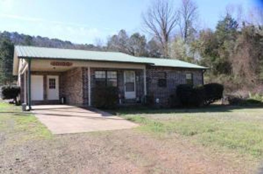 Brick home in the country complete with a shop and 5.75 acres. 3 bedroom 1.5 bathrooms, kitchen has new countertops and comes with appliances. This home offers a private backyard. Shop has electric, concrete floor and 2 roll up doors.
