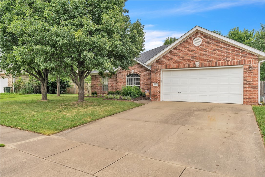 Updated Fayetteville home in a prime location just off Wedington Dr with quick I-49 access! This all-brick 3 bed, 2 bath home features a split floor plan, spacious living area with gas fireplace, and an eat-in kitchen with new appliances, farmhouse sink, and an upgraded gas cooktop. Other updates include fresh paint throughout, updated flooring in bedrooms and living room, recessed lighting, and modern fixtures in every room. The primary suite offers double vanities, soaking tub with new faucet, and a beautifully updated walk-in tile shower. Additional updates include new mirrors and hardware in baths, landscaping, updated fire alarms, new hose faucets, and more. Relax on the extended back patio in your fully fenced backyard. New roof in 2023. Move-in ready and close to shopping, dining, and all NWA has to offer—don’t miss it!