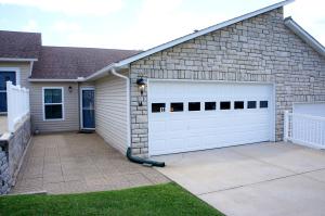 Very well maintained 2 bedroom, 2 bath condo with attached 2 car garage and open living area with attached sunroom. Gated community for seniors 55+. Gas fireplace, pantry, hardwood & ceramic tile flooring. Call soon!