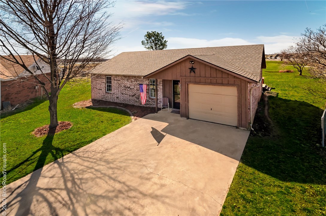 This cozy home sits on nearly a half acre lot overlooking fields and a pond. It would make a great starter home for a family or would be a good investment home for investors who are looking for a rental property. It's in a quiet neighborhood at the end of a cul-de-sac. It's close to schools, shopping, restaurants, and only 6 miles away from 1-49.