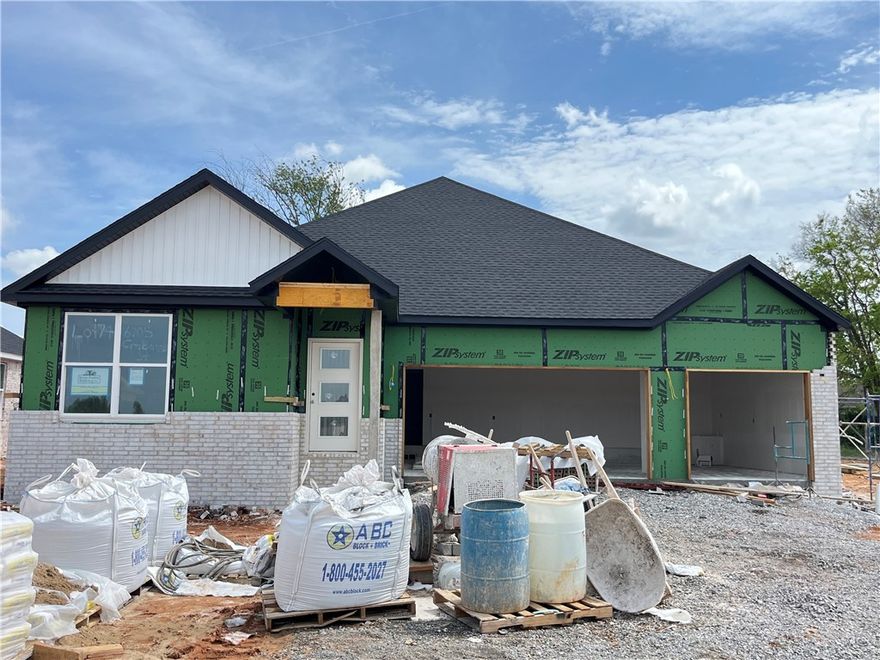 Experience the Baxter Plan at Walnut Grove.
Act quickly — select interior finishes may still be available for buyer customization. 
This thoughtfully designed single-level home offers four bedrooms, two baths, and a spacious three-car garage, delivering refined living with both comfort and sophistication.
Inside, you’ll find an expansive open-concept layout highlighted by soaring vaulted ceilings with elegant beam detailing and a striking gas log fireplace. The gourmet kitchen features custom soft-close cabinetry, a gas range with a fully vented hood, built-in microwave, and walk-in pantry — blending beauty and function seamlessly.
The primary suite serves as a private retreat, complete with a spacious walk-in shower and dual vanity offering abundant storage.
Outdoors, the covered back deck is equipped with gas and internet connections, creating the perfect setting for elevated entertaining and effortless relaxation.
Blinds, gutters, and wood privacy fence included.