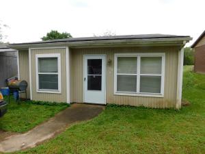 Compact 3 Bedroom 2 Bath Home or Rental, kitchen-Dining-Living Combo, large pantry closet off kitchen, washer/dryer connections in closet off hall bath, storage building in back yard. Convenient location on south end of Harrison near NAC. Presently rented, current tenant has been there for 5 years and would like to stay.
