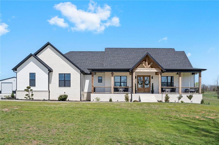 This brand new construction custom home can now be yours! Offering 3 spacious bedrooms all with an en-suite, a private office, and a half bath for your guests. The front porch is a dream looking out over your own fishing pond on your 4.68 acres of land. 3 car side load garages and a 30 X 30 Shop. What more could you want?! Priced perfectly to sell fast! Located just 24 minutes to the Bentonville and 8 minutes to Downtown Rogers, it’s a gem!