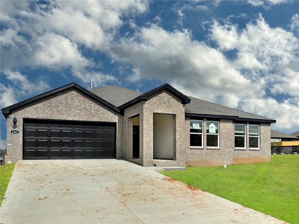 Delightful Dean plan (With a 3-car garage!!) Find your new home in Northwest Arkansas in Hudson Heights in Prairie Grove. These homes have fabulous features for comfortable, modern living. Each home features LVP flooring throughout (per plan)! The living room features a beautiful electric fireplace with a poplar mantle! Kitchens have Quartz countertops, stainless steel appliances, and a stainless steel undermount kitchen sink with a pull-out faucet! Bedroom one with ensuite will feature a ceiling fan, quartz counters with dual sinks, oversized Walk-in Shower and a walk-in closet. Home will be 4-sided brick with Hardie® fascia (per plan), and a covered patio (per plan). Taxes and Parcel TBD.
