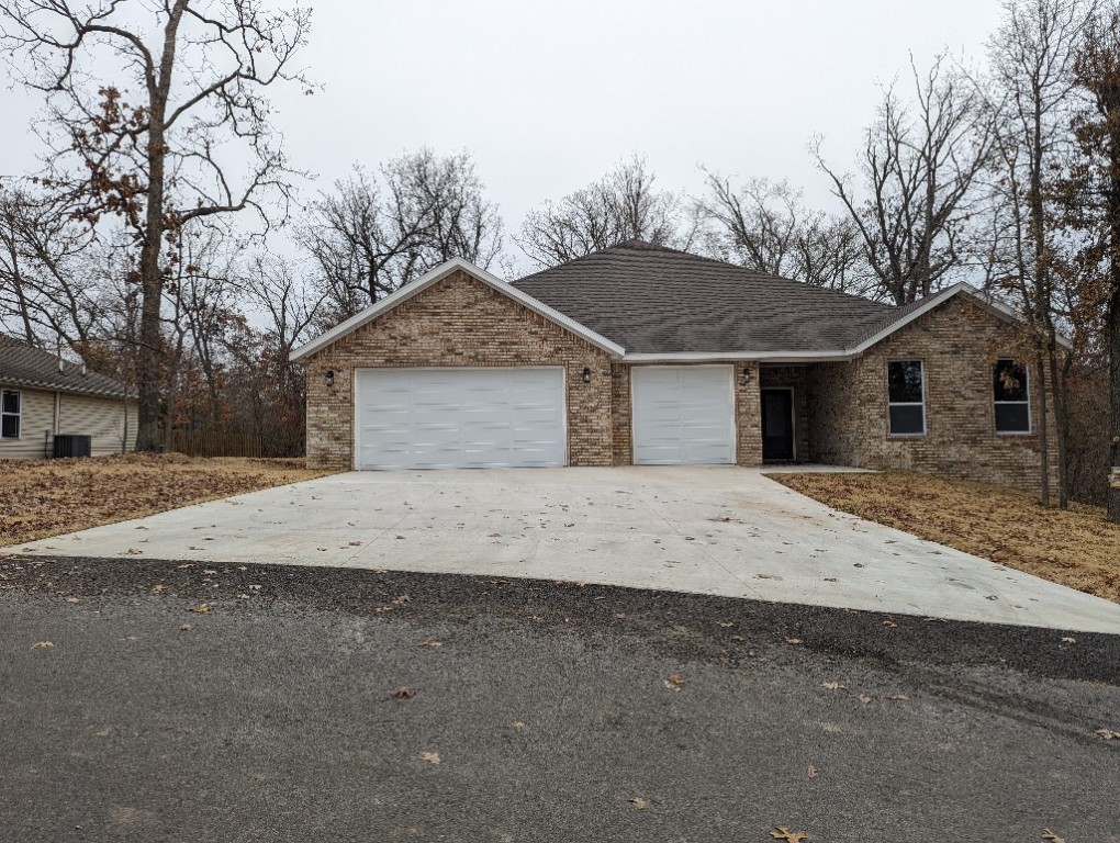 Welcome home to this exquisitely crafted residence that offers a harmonious blend of style and functionality. This beautiful 5 bedroom, 3 bath, 3 car garage home is located in a nice and quiet cul-de-sac. All brick exterior and is on city sewer which makes it a very low maintenance. This single level house is on slab and is very energy efficient with an insulated oversize three car garage. Super-spacious primary bedroom. Kitchen features abundant custom cabinets, deep drawers, and a generous pantry. Living room has a high ceiling and a gas log fireplace. The cooking range is pre plumbed for gas and can be upgraded to a gas range. Gutters with leaf guard, garage floor epoxy, 2.5 inch custom blinds, 6 ft privacy wood fencing. Huge back yard big enough for a swimming pool. Bella Vista has 6 golf courses, recreational lakes, 150+ miles of world-class bike trails, recreation centers, swimming pools, tennis, and more.