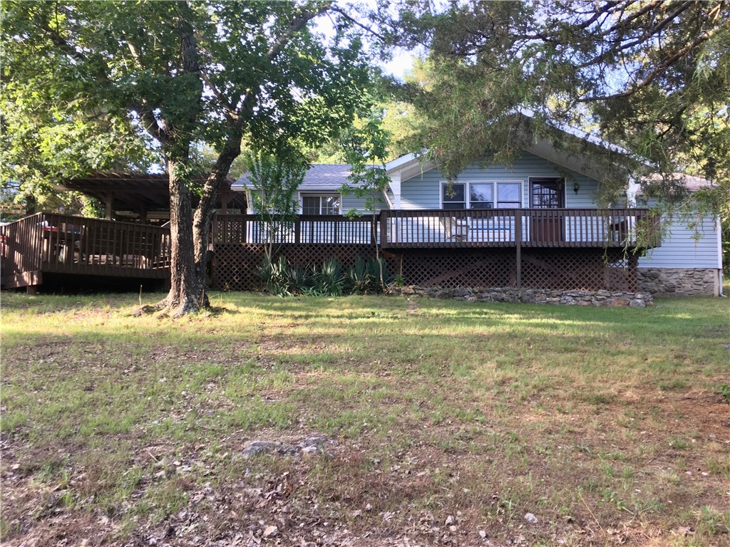 Don't miss out on this cozy/adorable lake cabin with a 10' x 30' boat slip included in sale price. The 97' Bayliner boat is for sale, $4900. Home has a Carrier mini-split installed for heating/cooling. Slip has solar power and electric outlet. Rare find at this price and a great opportunity as a short term rental. Attractive furnishings are all negotiable. Located on the deepest and clearest part of Beaver Lake. Come to the lake!
Please allow 24 hours for response to offers.