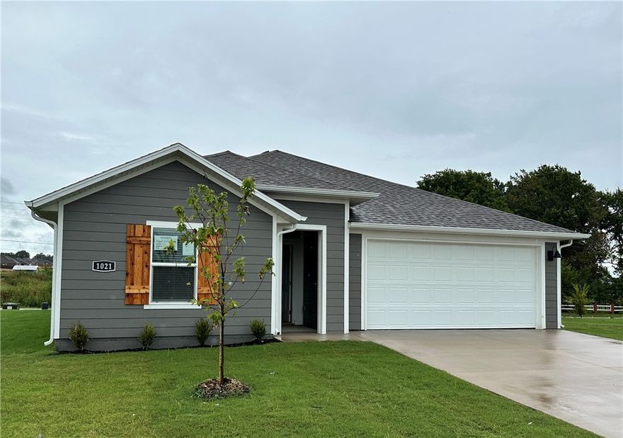 Lovely Lakeway plan in Selah Meadows, situated in the heart of Prairie Grove.  Each home in Selah Meadows is meticulously crafted with attention to detail, creating a space that feels both luxurious and welcoming.  From the moment you walk through the door, you'll be greeted by modern features and spacious layouts that cater to every lifestyle. Our homes boast premium finishes and thoughtful designs, ensuring that you'll be stepping inside your own personal oasis. The Lakeway plan includes a private office! These homes will be complete with LVP flooring throughout, wood shelving in all closets, pantry and utility room.  Kitchen will have granite counters, 36-inch cabinets, stainless steel appliances! Ceiling fan in Living room and Bedroom One.  Bedroom one bath will have granite kitchen counters, double sinks, and a walk-in shower. Home will have a Garage Door Opener, and a Landscape package. Home will have Beautiful 4 Sides Hardie Siding®.