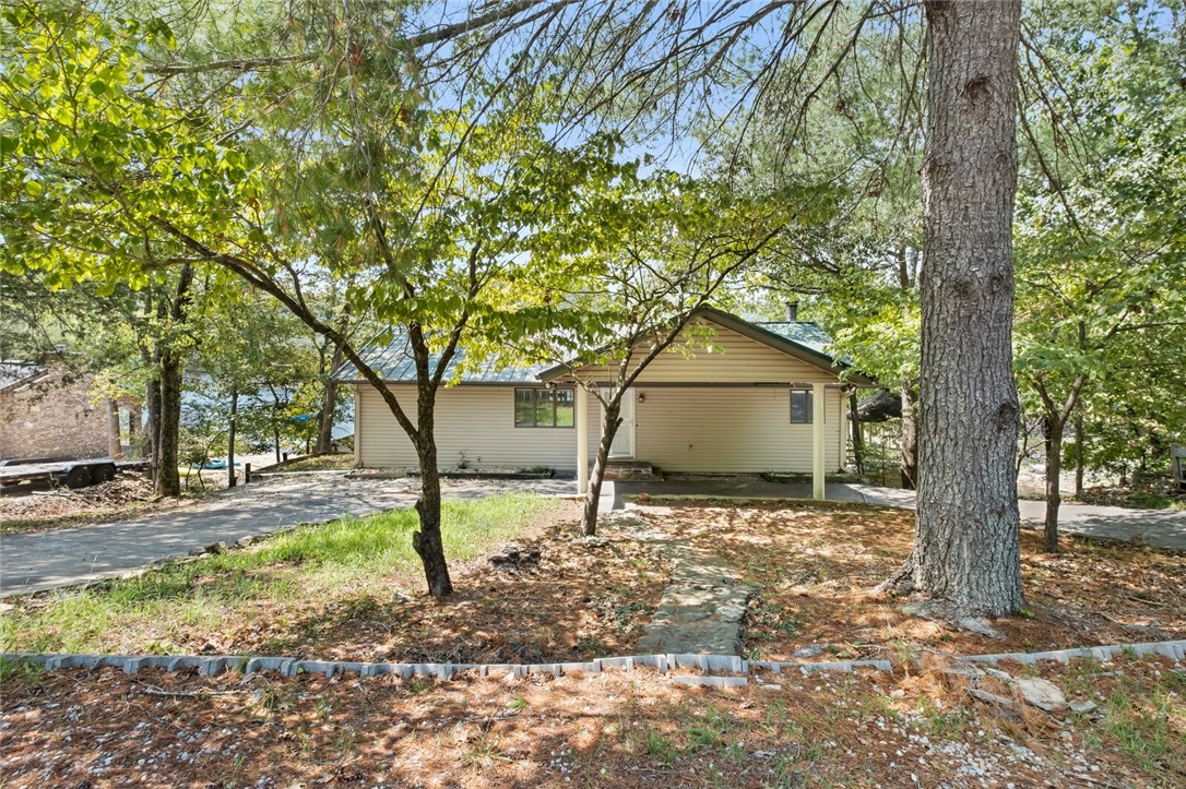 Hard to Find 2 Stall Private Boat Dock A SPECIAL DOCK SET UP no letting in & out Dock Floats up & Down , Boat Lifts Covey , Very deep cove ( Sail Boat area ) Turtle Cove . Property Sets at the End of a very Private Cove with a Extra Lot to build an out door Kitchen OR garage for your play toys. RV Pad with Sewer & Water .
This Is a TURN Key Property Ready For Move in . Paddleboards /Kayaks Several Convey , all furnishings convey .